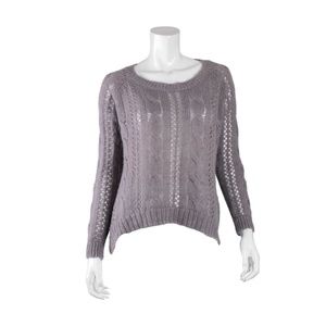 Soft mauve sweater with longer sides.